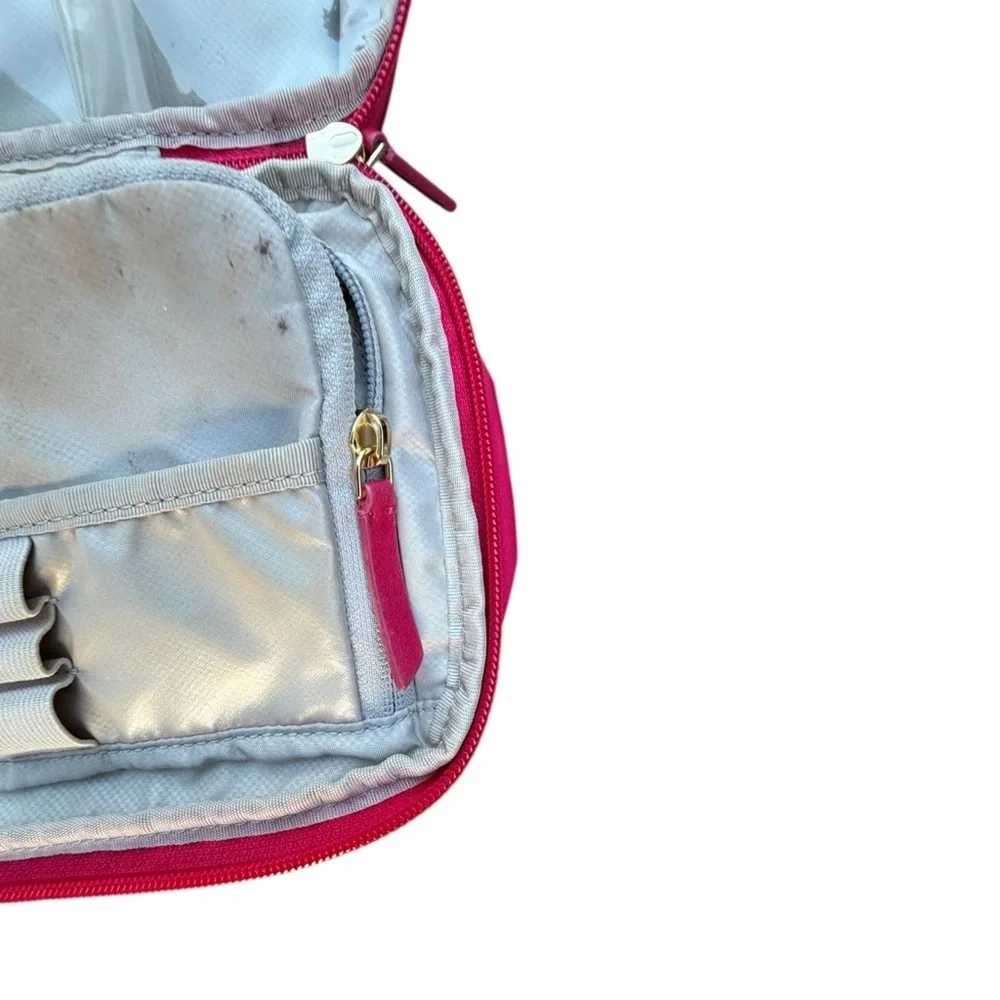 Tumi pink hanging
